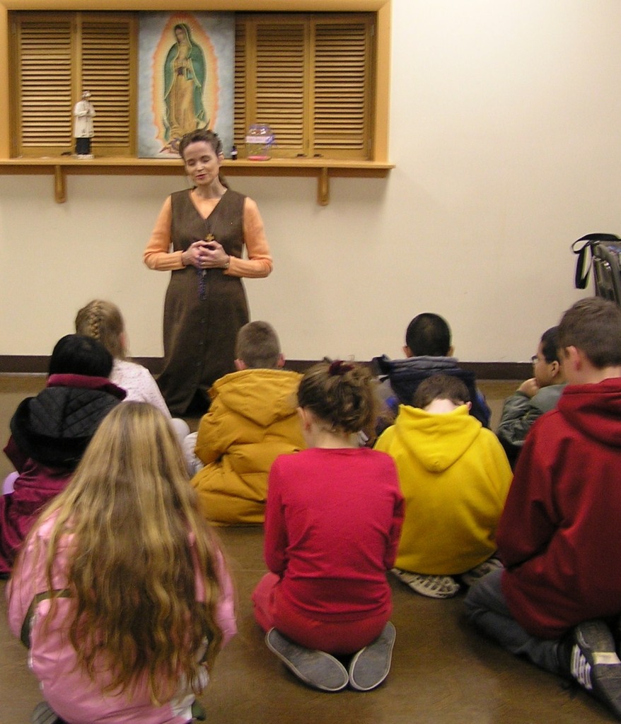 OLYMPUS DIGITAL CAMERA Children learning to pray